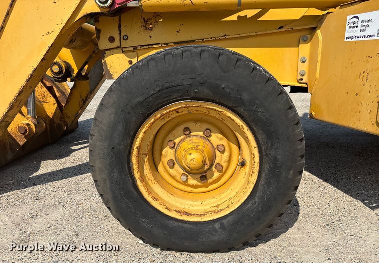 image for item EC3732 2000 John Deere 310E backhoe