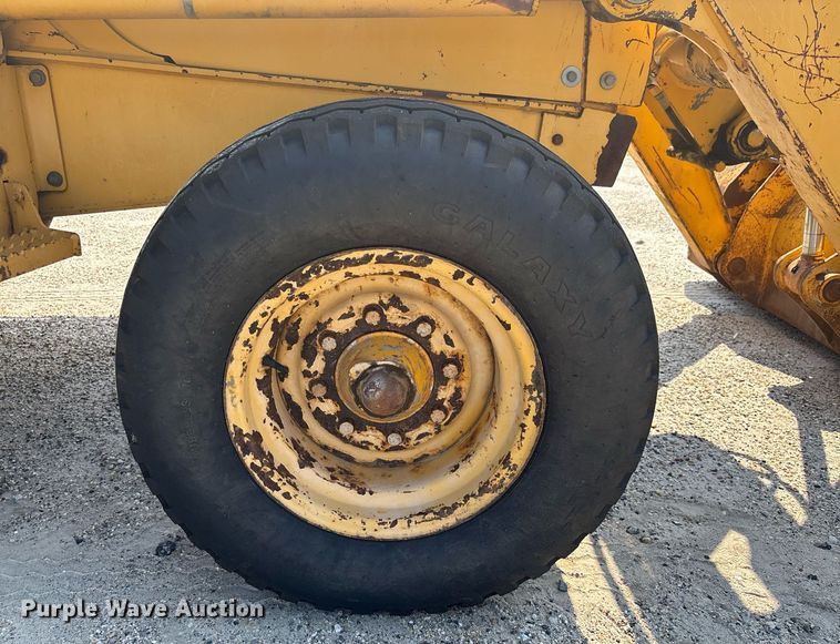 image for item EC3732 2000 John Deere 310E backhoe