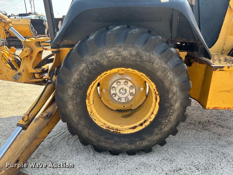 image for item EC3732 2000 John Deere 310E backhoe