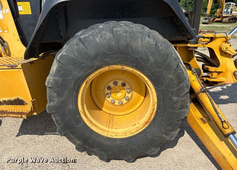 image for item EC3732 2000 John Deere 310E backhoe