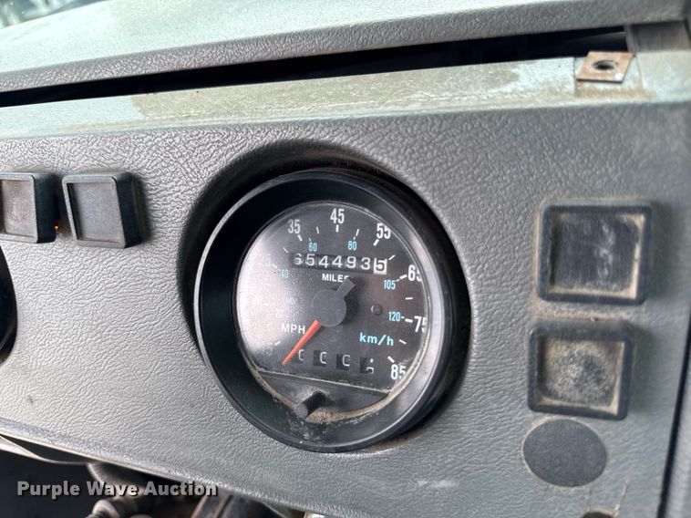 image for item EM2104 2000 Mack RD688S roll-off container truck