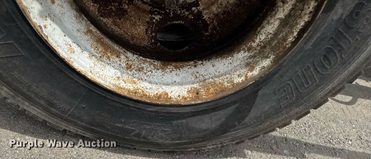 image for item EM2104 2000 Mack RD688S roll-off container truck