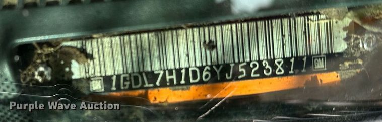 image for item EN3963 2000 GMC C7500 forestry bucket truck