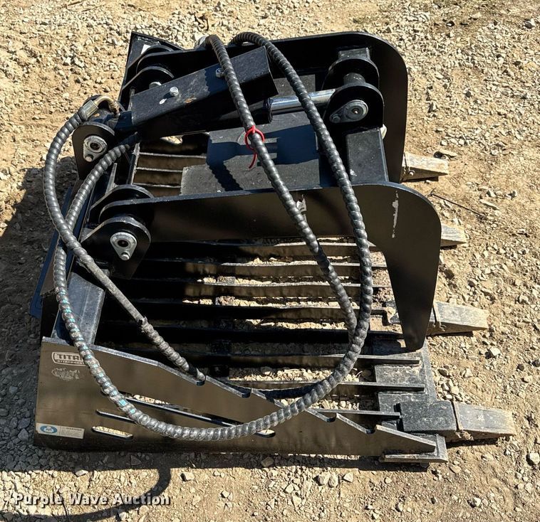 image for item EN4584 Titan Compact utility loader rock grapple bucket