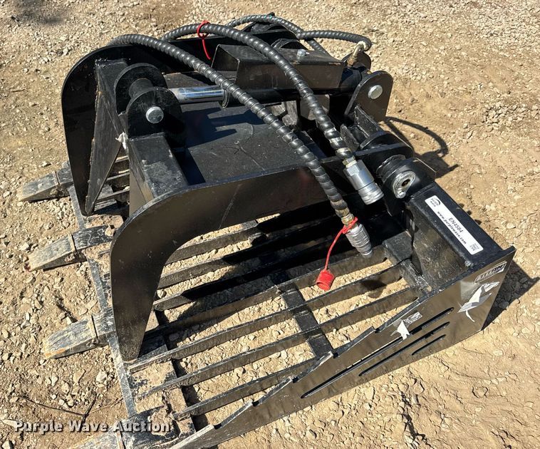 image for item EN4584 Titan Compact utility loader rock grapple bucket