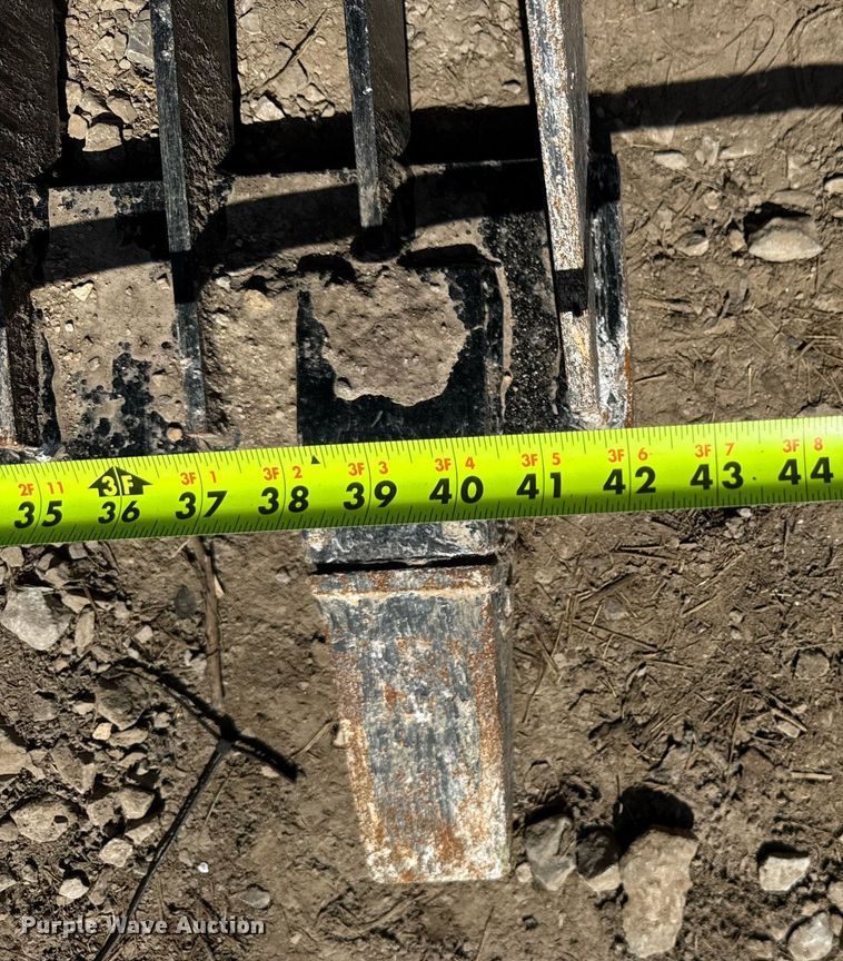 image for item EN4584 Titan Compact utility loader rock grapple bucket