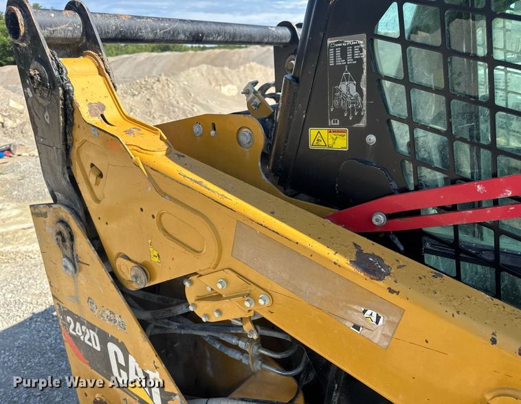 image for item EN4621 2016 Caterpillar 242D skid steer loader