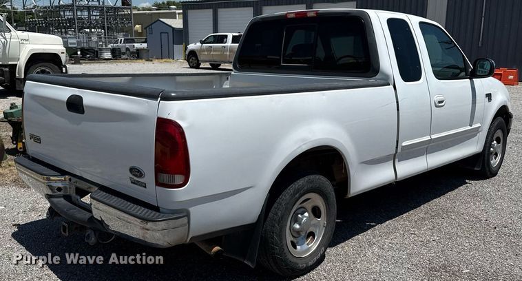 image for item DZ8664 2001 Ford F150 SuperCab pickup truck