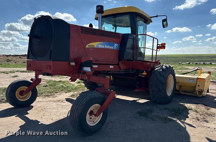 image for item DK6959 2009 New Holland H8080 swather / windrower
