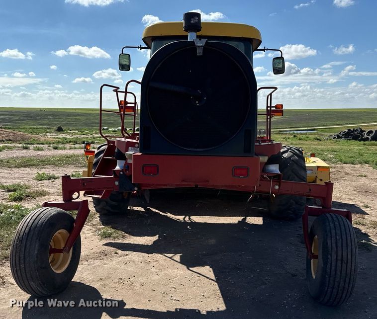 image for item DK6959 2009 New Holland H8080 swather / windrower