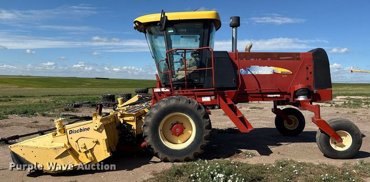 image for item DK6959 2009 New Holland H8080 swather / windrower