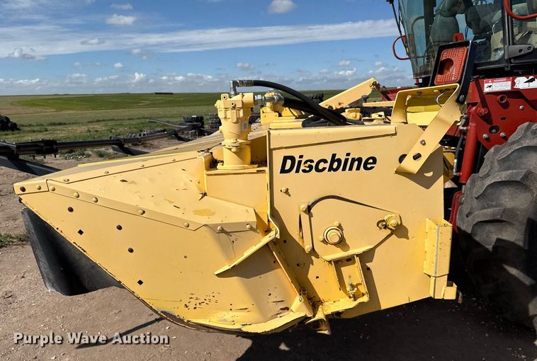 image for item DK6959 2009 New Holland H8080 swather / windrower