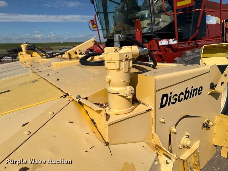 image for item DK6959 2009 New Holland H8080 swather / windrower