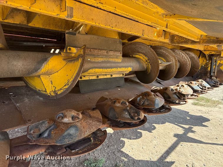 image for item DK6959 2009 New Holland H8080 swather / windrower