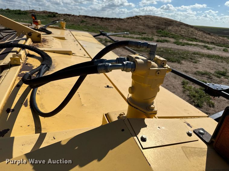 image for item DK6959 2009 New Holland H8080 swather / windrower