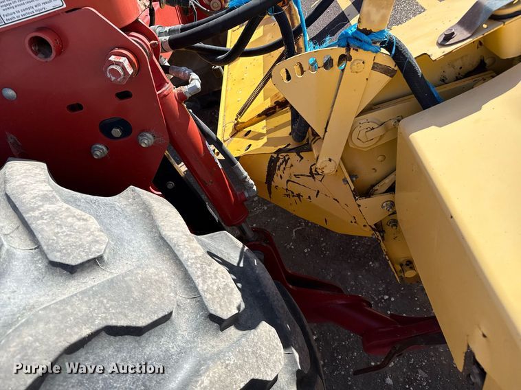 image for item DK6959 2009 New Holland H8080 swather / windrower