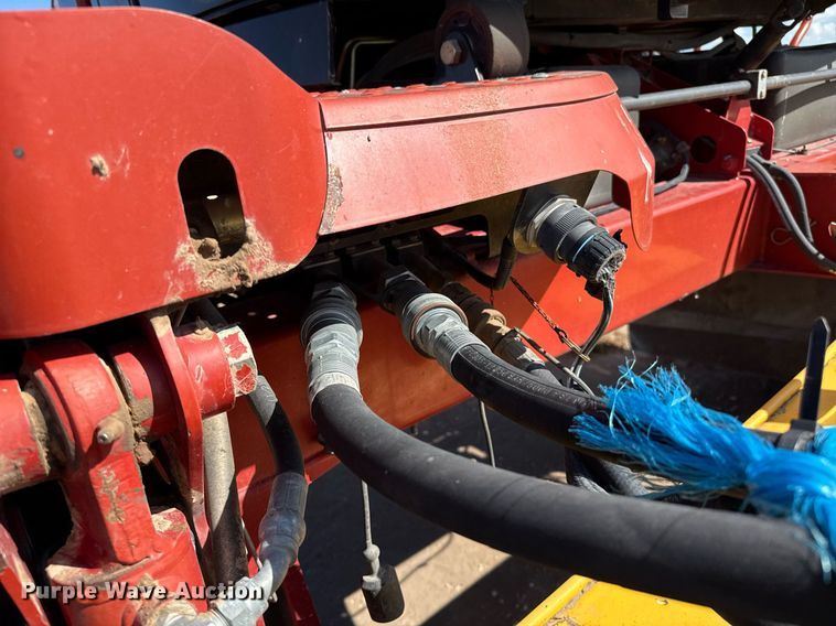 image for item DK6959 2009 New Holland H8080 swather / windrower