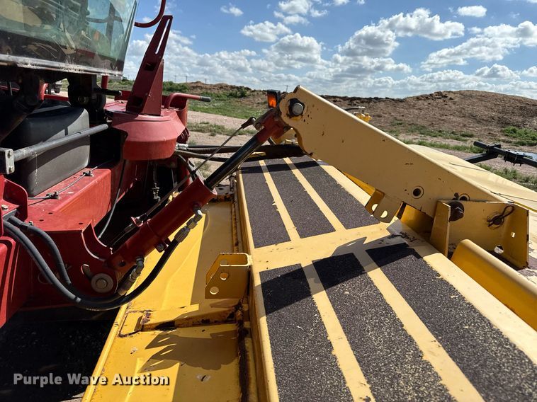 image for item DK6959 2009 New Holland H8080 swather / windrower