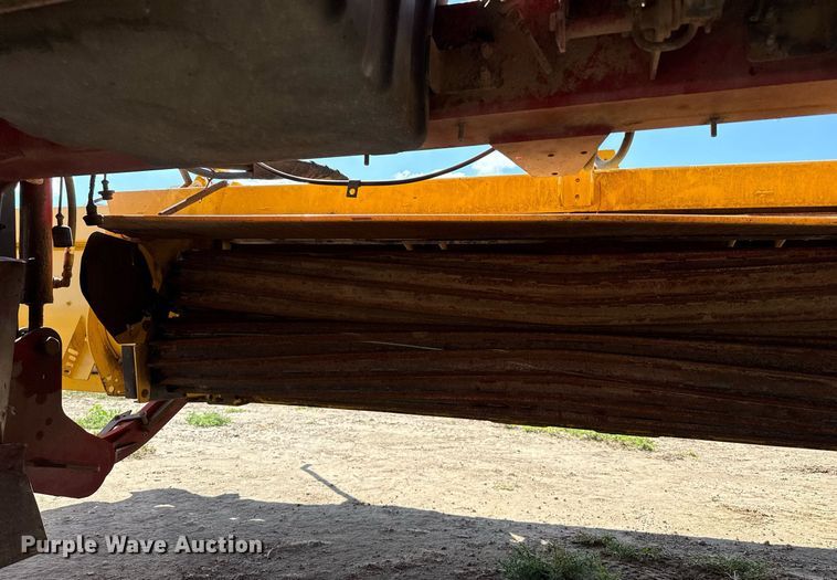 image for item DK6959 2009 New Holland H8080 swather / windrower