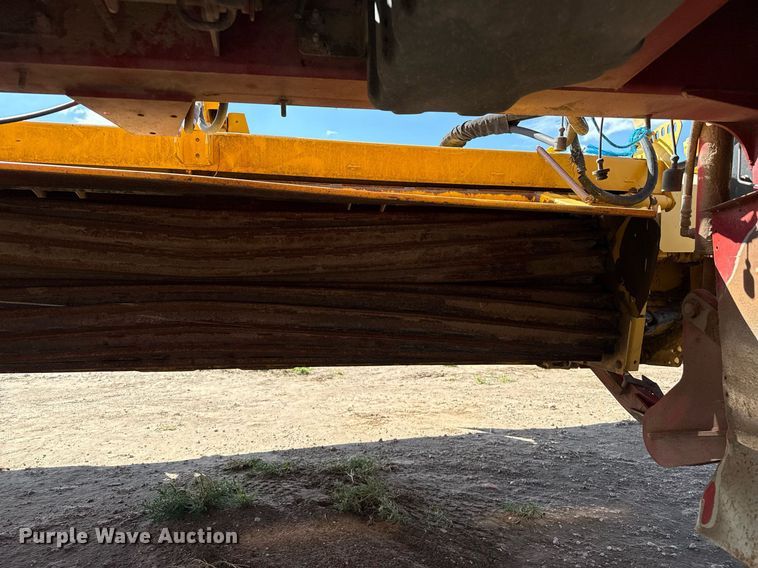 image for item DK6959 2009 New Holland H8080 swather / windrower