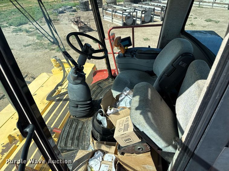 image for item DK6959 2009 New Holland H8080 swather / windrower