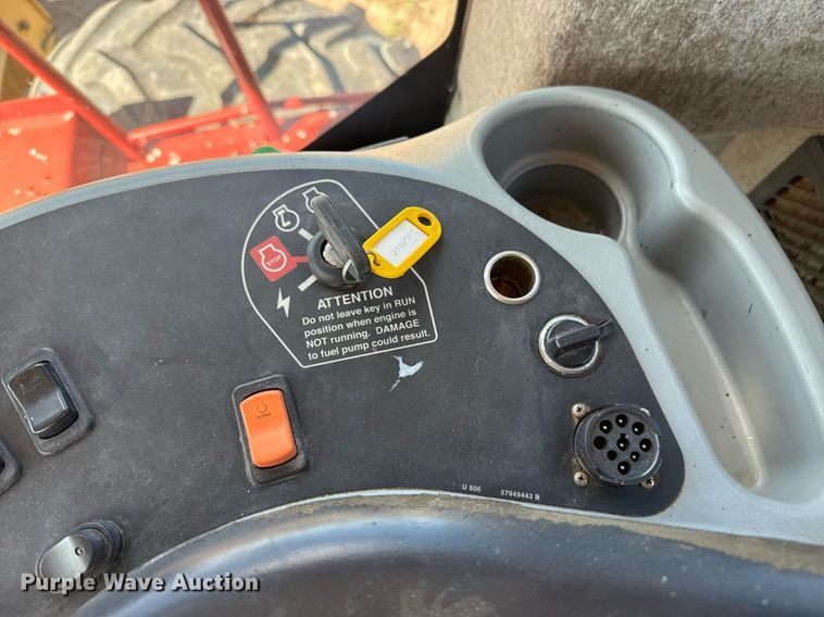 image for item DK6959 2009 New Holland H8080 swather / windrower