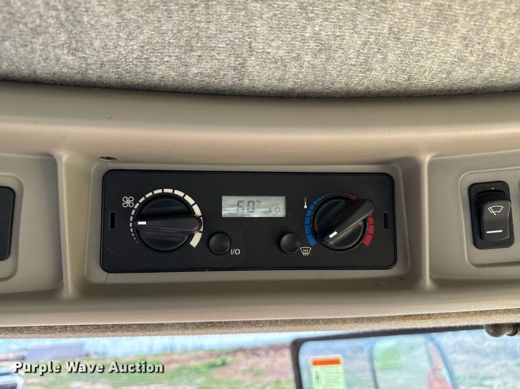 image for item DK6959 2009 New Holland H8080 swather / windrower