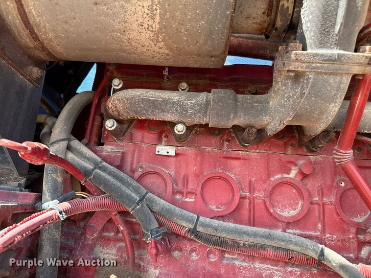 image for item DK6959 2009 New Holland H8080 swather / windrower