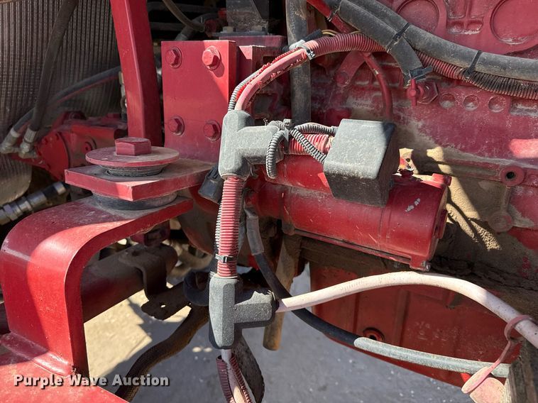 image for item DK6959 2009 New Holland H8080 swather / windrower