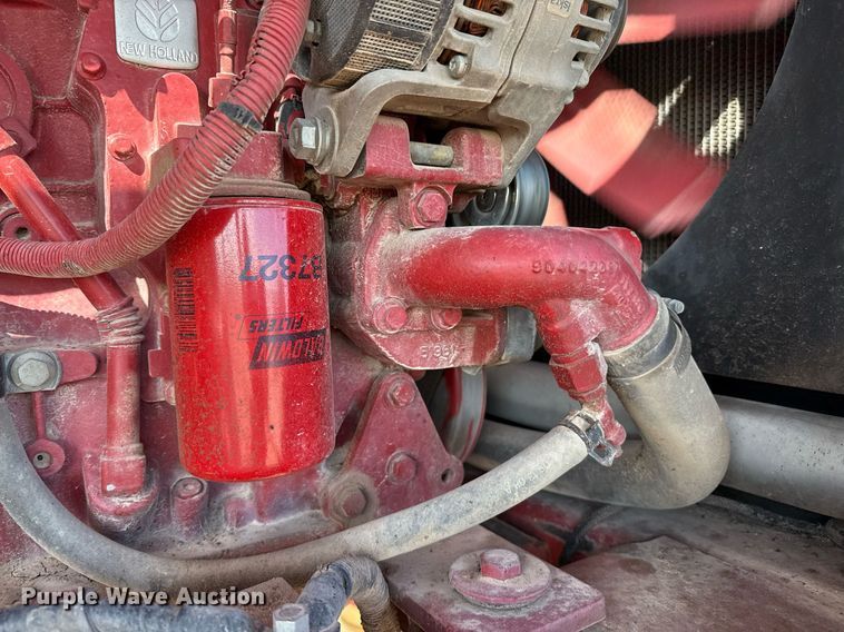 image for item DK6959 2009 New Holland H8080 swather / windrower