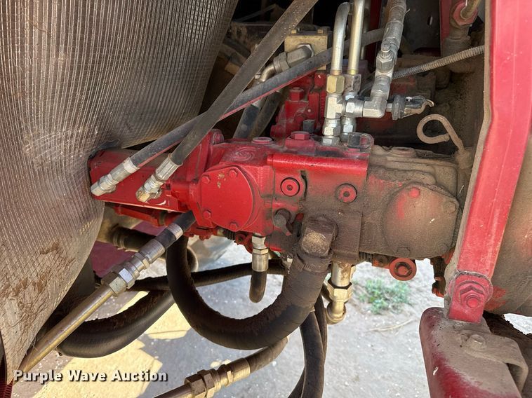 image for item DK6959 2009 New Holland H8080 swather / windrower