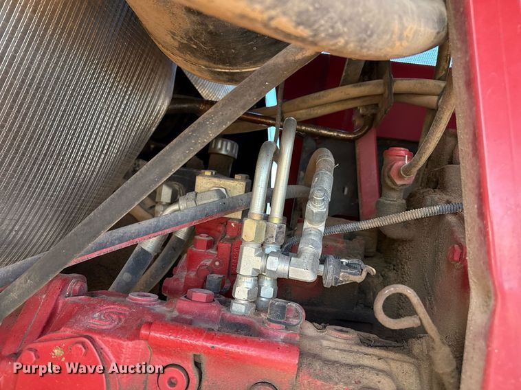 image for item DK6959 2009 New Holland H8080 swather / windrower