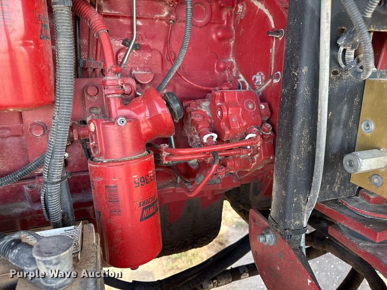 image for item DK6959 2009 New Holland H8080 swather / windrower