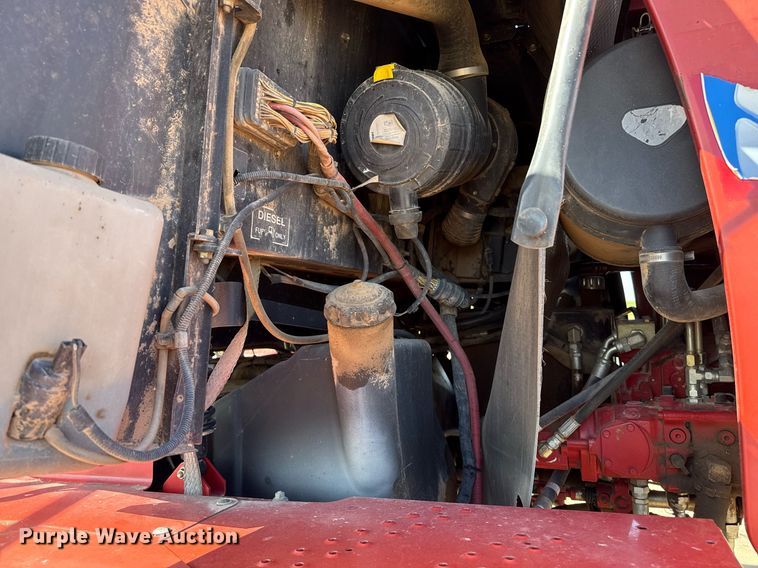 image for item DK6959 2009 New Holland H8080 swather / windrower