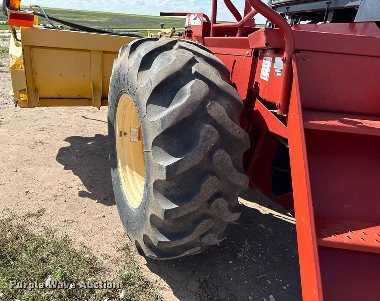 image for item DK6959 2009 New Holland H8080 swather / windrower