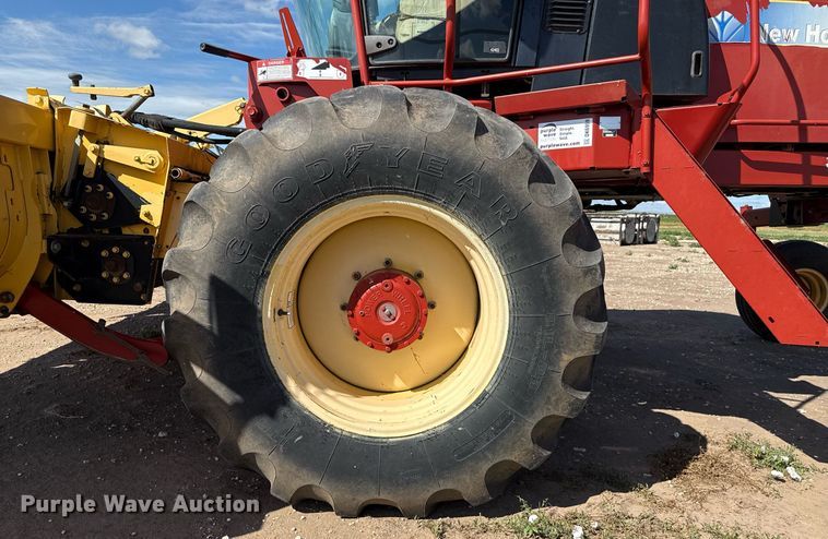 image for item DK6959 2009 New Holland H8080 swather / windrower