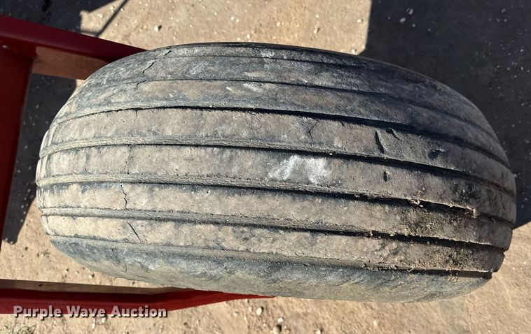 image for item DK6959 2009 New Holland H8080 swather / windrower