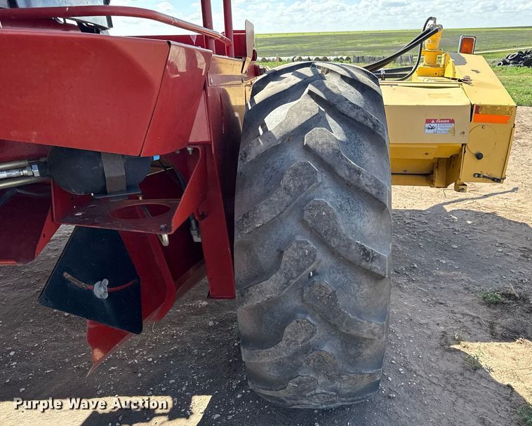 image for item DK6959 2009 New Holland H8080 swather / windrower