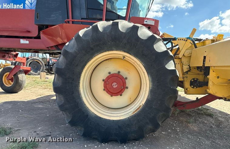 image for item DK6959 2009 New Holland H8080 swather / windrower