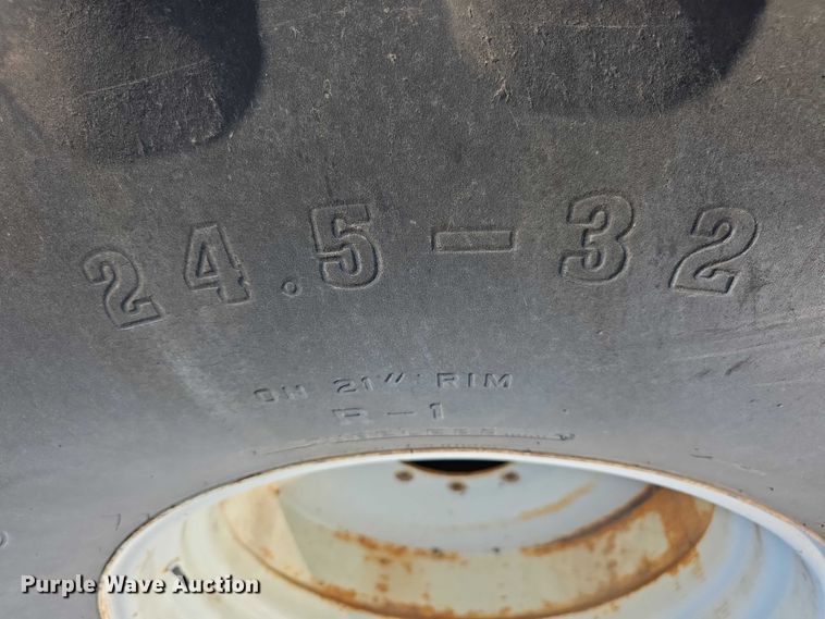 image for item EK5440 (2) Firestone 24.5-32 tires and wheels