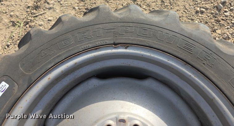 image for item EK5441 (2) 11.2-24 Co-op tires and wheels