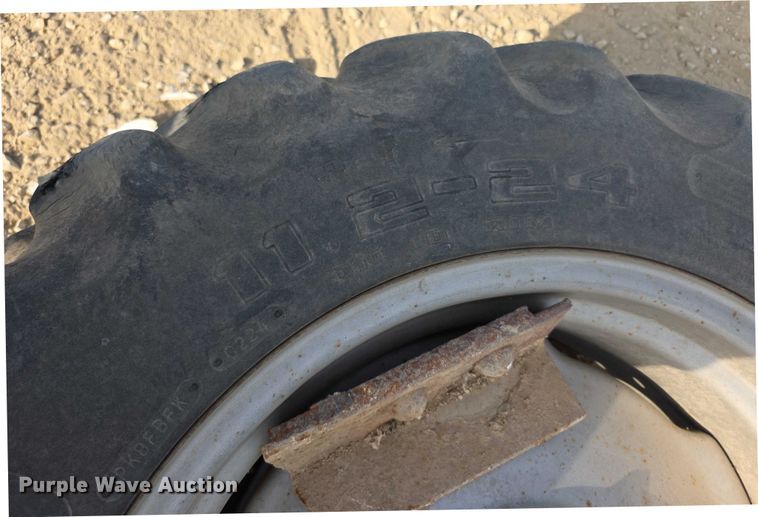 image for item EK5441 (2) 11.2-24 Co-op tires and wheels