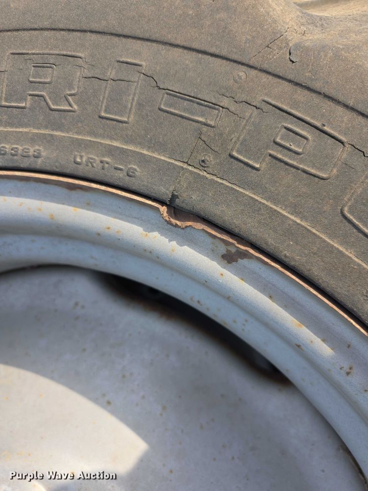 image for item EK5441 (2) 11.2-24 Co-op tires and wheels