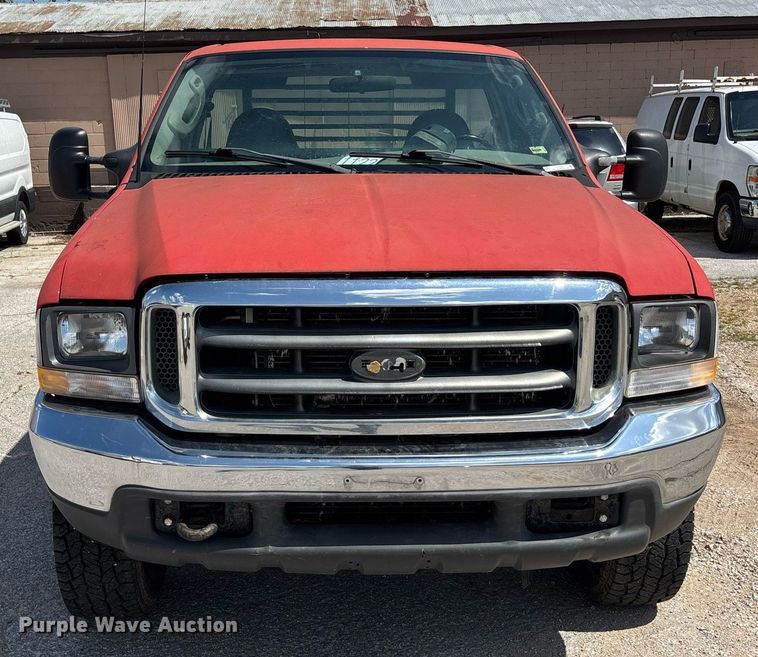 image for item DY0360 2003 Ford F250 flatbed pickup truck