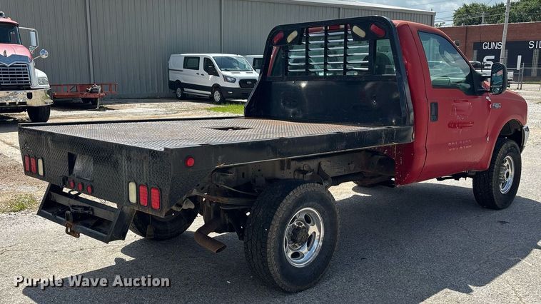 image for item DY0360 2003 Ford F250 flatbed pickup truck
