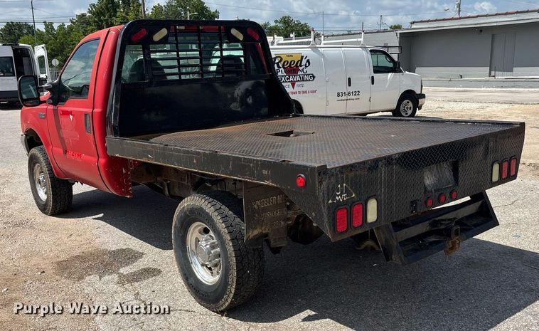 image for item DY0360 2003 Ford F250 flatbed pickup truck
