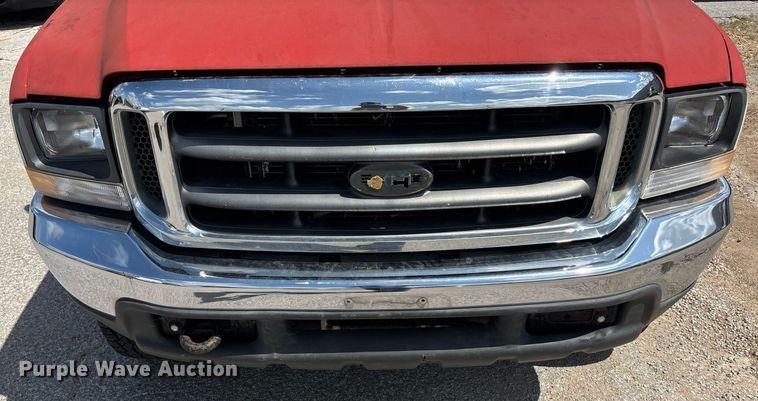 image for item DY0360 2003 Ford F250 flatbed pickup truck