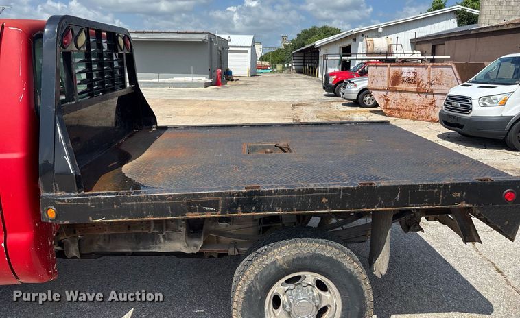 image for item DY0360 2003 Ford F250 flatbed pickup truck