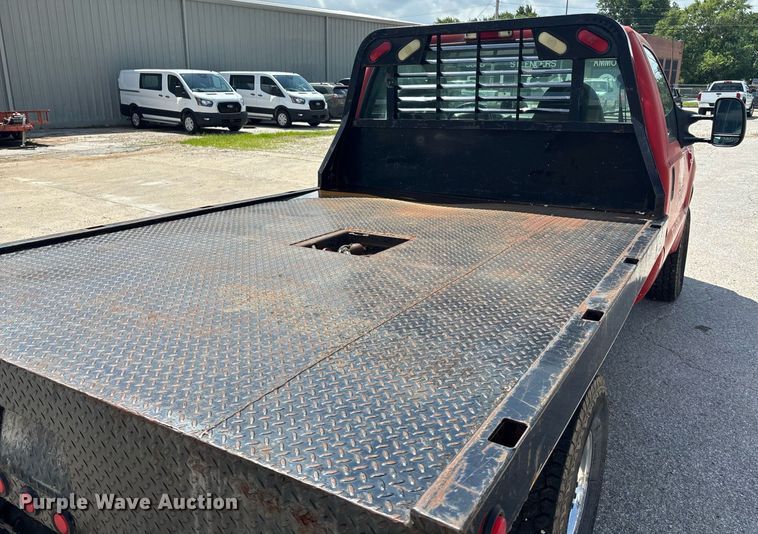 image for item DY0360 2003 Ford F250 flatbed pickup truck