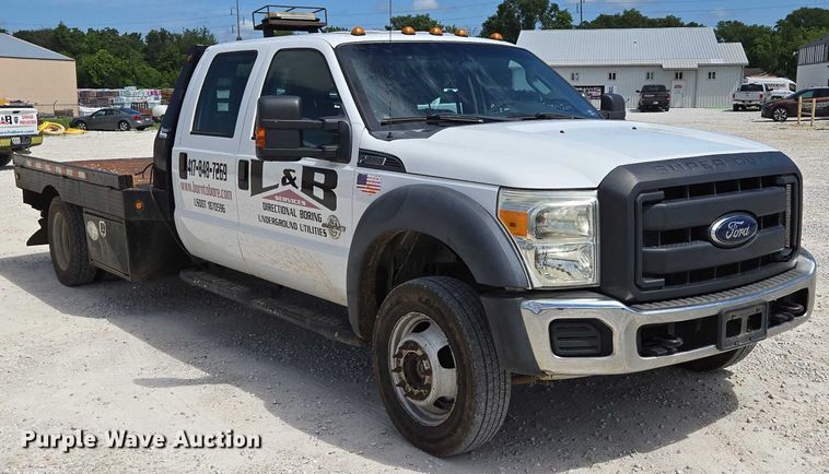 image for item ED2137 2013 Ford F550 Super Duty Crew Cab flatbed truck